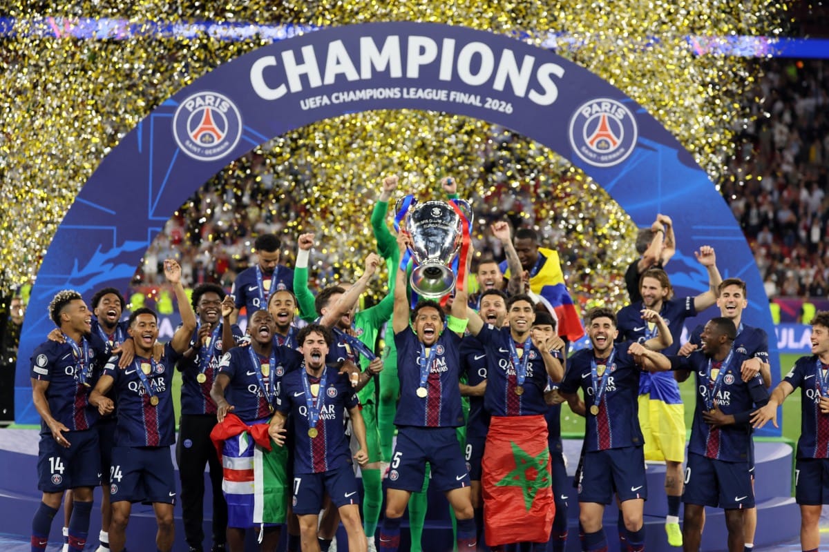 Paris Saint-Germain's Brazilian defender #05 Marquinhos lifts the trophy after winning the UEFA Champions League final football match between Paris Saint-Germain (PSG) and Arsenal FC at the Puskas Arena in Budapest on May 30, 2026.