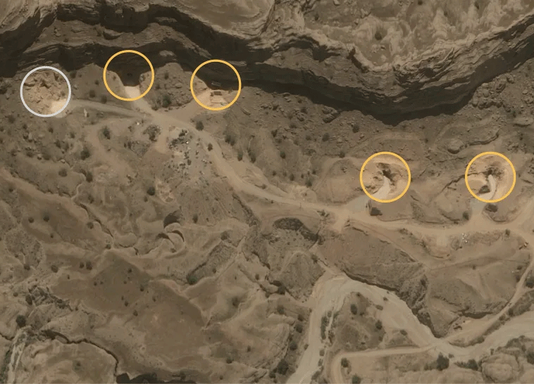 At a missile base in Dezful, Iran, four of the five entrances to the underground facility could be seen reopened on May 12. Circled in gray is the one entrance to the complex that remained blocked. 
