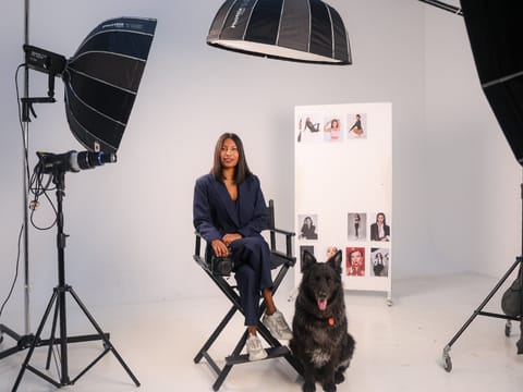 Candace Braganza, Founder of Sculpt25 Creative, with her pet dog.  