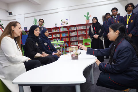 Aisha Sultan Majid Al Shamsi, Executive Director of the Ajman Office of Private Education Affairs, interacting with students 