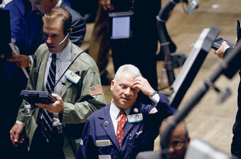 Traders at the New York Stock Exchange. Rapid rise in bond yields has made stocks skittish, and that could be a defining factor in the week ahead.