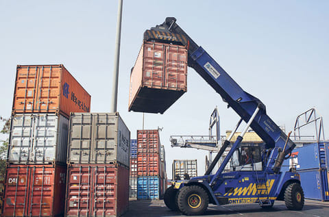 Containers being stacked at Nhava Sheva port in Navi Mumbai, India. India expects to restart negotiations for a free trade agreement with the US once President-elect Joe Biden's administration enters.
