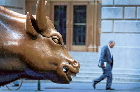 The bull statue near the New York Stock Exchange. Even as the pandemic rages on in several parts of the world, economic data continues to keep hopes alive of an – albeit slow – recovery, but investors can’t write-off every kind of risk just yet.
