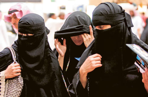 Saudi women visit the Saudi Travel and Tourism Investment Market fair in Riyadh, Saudi Arabia.