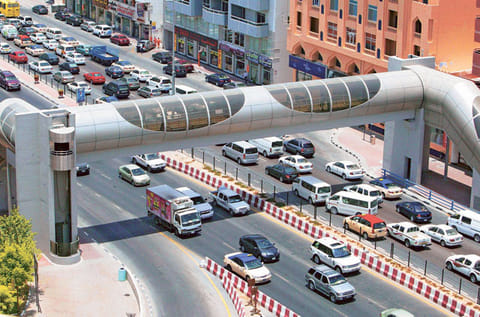 A pedestrian footbridge on Abu Bakr Seddiqi Road in Dubai.