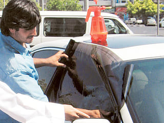 UAE: Dh1,500 fine for rolling tinted sunshade across car windshield while driving