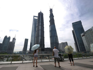 World’s second tallest building tops out in China