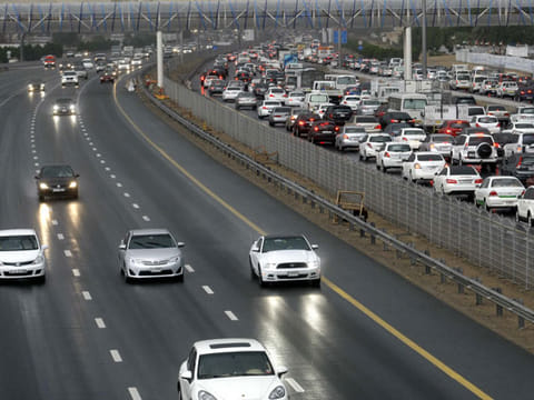 Traffic on Shaikh Mohammed Bin Zayed Road during heavy rain in Dubai.
