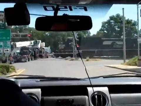 Video: Truck derails train at level crossing in Louisiana