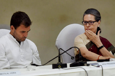 Congress President Sonia Gandhi with party Vice President Rahul Gandhi at the CWC meeting at party headquarters in New Delhi on Monday. 