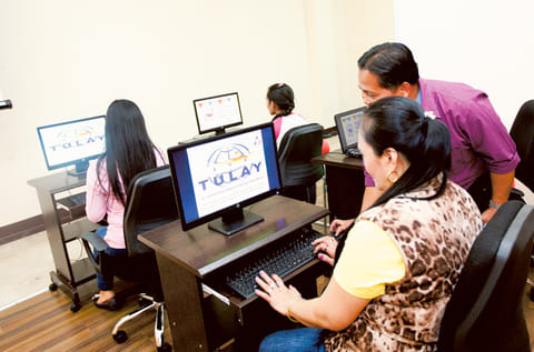 A housemaid takes computer classes at the Philippines Overseas Labour Office in Dubai.