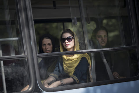 For Iranians, hope tinged with caution