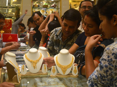 People buying Gold jewellery in a shop during the  Diwali festival called Dhanteras in Kolkata