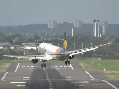 Watch: Pilot aborts landing in high wind
