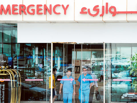 Medical workers leave a hospital’s emergency department  in the Saudi capital Riyadh.