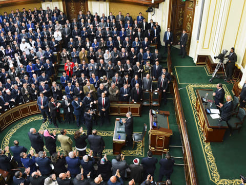 In this file 2019 picture, President Al Sissi and Ali Abdul Al, speaker of Egypt’s parliament, receive a standing ovation during the former’s visit to the parliament headquarters in Cairo.