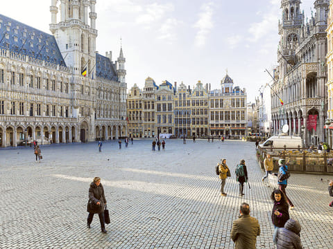 Tourists at the almost empty Grand Place in Brussels. Right now, travelling in the EU’s 27 nations is a trial for tourists and airlines alike.