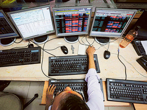 India waits for global investors and their funds to return. The latest budget offers a few sops to get their interest, but will these be enough? File picture of a brokerage office in Mumbai. 