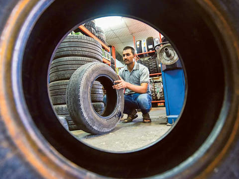 An employee at an auto workshop in Dubai. 