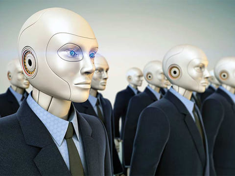 Digital giants are turning workers into robots