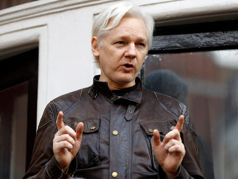 File photo: Julian Assange speaks to the media outside the Ecuadorian embassy in London, Friday May 19, 2017. 