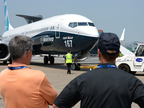 A Boeing 737 MAX 9 is moved on the tarmac prior to performing in a flying display at Le Bourget on June 21, 2017, during the International Paris Air Show.