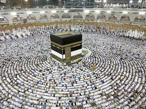 Muslim worshipers perform the evening (Isha) prayers at the Kaaba, Islam's holiest shrine, at the Grand Mosque in Saudi Arabia's holy city of Mecca on August 25, 2017, a week prior to the start of the annual Haj pilgrimage in the holy city.
