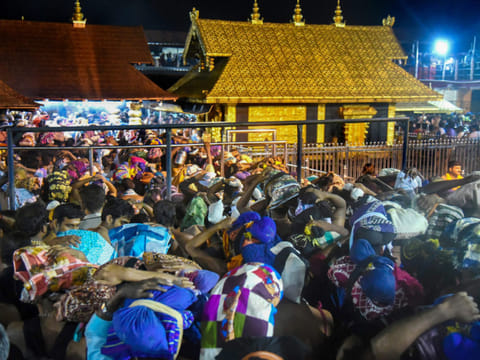 Devotees arrive to pay obeisance at Lord Ayyappa Temple in Sabarimala, Thursday, October 18, 2018.