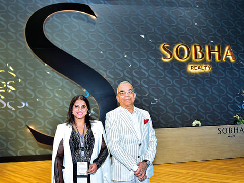Jyotsna Hegde, president (left) and P.N.C. Menon, founder and chairman of Sobha Realty in front of the new Sobha branding at Cityscape Global at the DWTC.