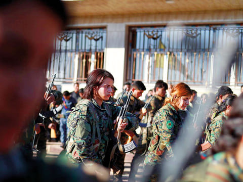 Fighters with the Syrian Democratic Forces, the Kurdish-led militia that is fighting the Islamic State with American help, at the funeral of one of their commanders, who was killed in a battle in Hajin, Syria, last month.
