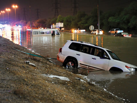 A flooded street in Kuwait on Friday night. The country received 29.63mm of rain since Thursday.