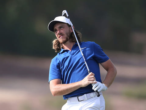 England's Tommy Fleetwood plays a shot on the 16th hole during the second round of the DP World Tour Championship golf tournament in Dubai.