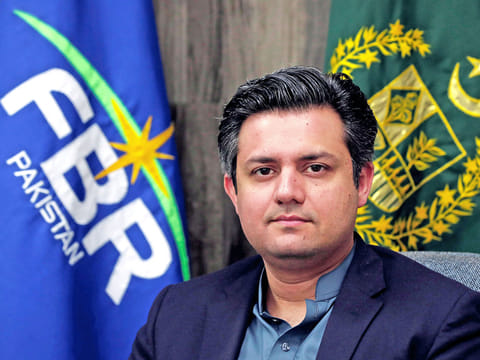 Muhammad Hammad Azhar, Minister of State for Revenue is seen at his office in Islamabad, Pakistan November 14, 2018.