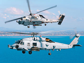 The multi-role MH-60 Romeo anti-submarine helicopters — deemed the most capable naval helicopter available today