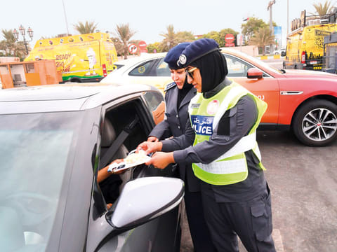 Happiness Patrol police reward motorists in Abu Dhabi for their good driving behaviour and following road traffic rules.
