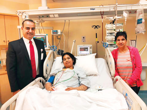 Dr Rafik Abu Samrah with Rose Mary Diaz  (in ICU) and a friend.