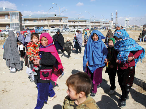 Afghan families fleeing from the districts of Malistan and Jaghori arrive in Ghazni, Afghanistan on November 14. 