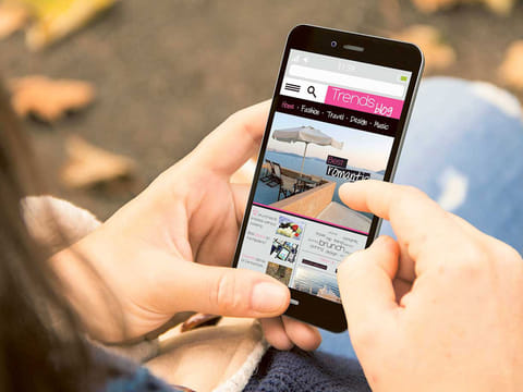 A mobile phone user browses the Internet.