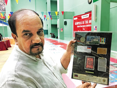 Sanjay N Joshi with his currency collection exhibited at the UAE- India Fest organised by the Indian Social and Cultural Centre (ISC) in Abu Dhabi.