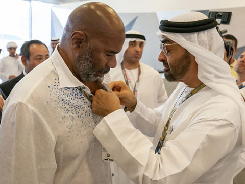 File photo of President His Highness Sheikh Mohamed bin Zayed (right) with Steve Harvey at the Paddock Club at Yas Marina Circuit in Abu Dhabi 