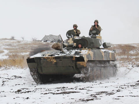 A Ukraine army APC moves toward on position at an undisclosed location in eastern Ukraine.