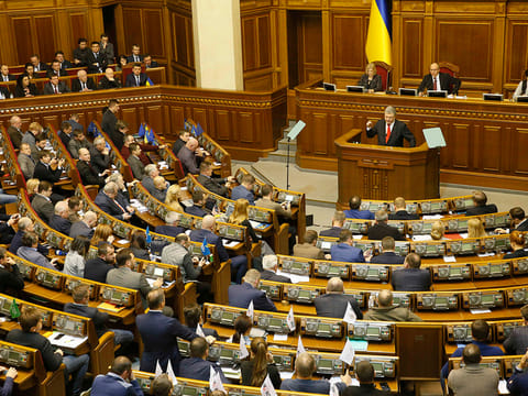 Ukrainian President Petro Poroshenko speaks during a parliament session to review his proposal to introduce martial law.