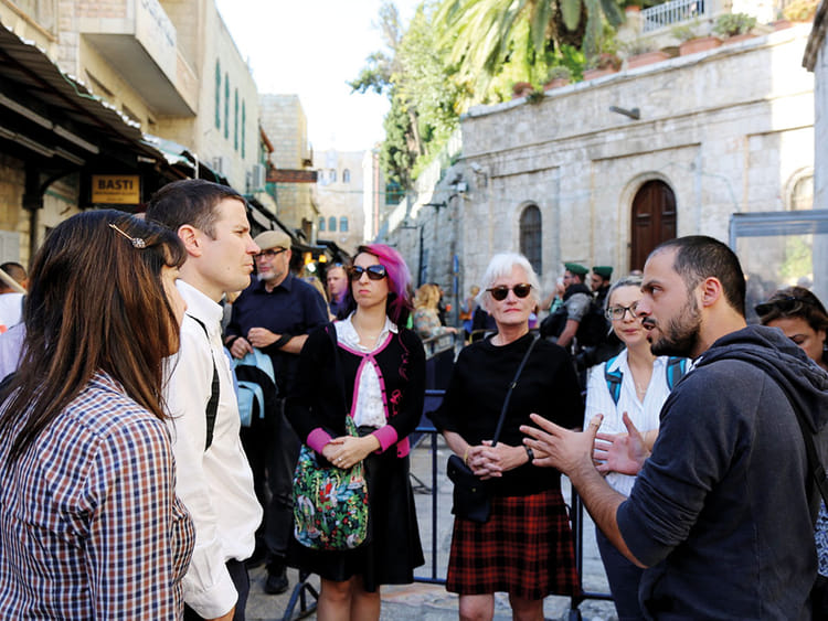 writers-listening-to-tour-guide-in-Jerusalem-(Read-Only)