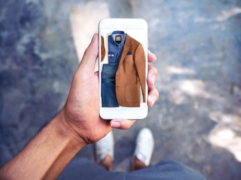 Browsing clothes using an app.