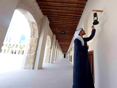 Emirati Sultan Al Baadi look at the traditional lamp at the Outer Palace  at the Qasr Al Hosn Palace, Abu Dhabi during the media tour.