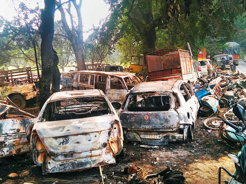 Charred vehicles which were set on fire by a mob in Monday’s violent clashes in Uttar Pradesh over the alleged illegal slaughter of cattle, in Bulandshahr.