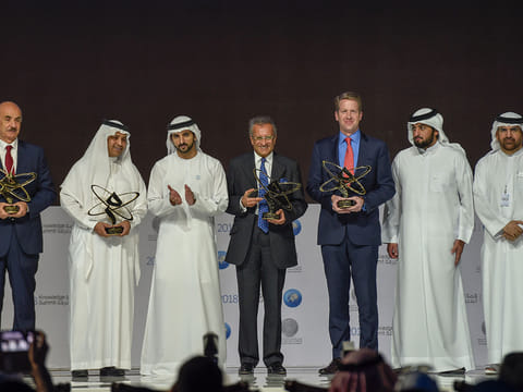 Shaikh Hamdan Bin Mohammad, Shaikh Ahmad Bin Mohammad and Jamal Bin Huwaireb with the winners of Mohammed Bin Rashid Al Maktoum Knowledge Awards in Dubai.