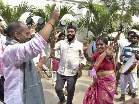 Hyderabad: Telangana Rashtra Samithi (TRS) Party workers celebrate after the initial trends show the party leading in the states Assembly elections, at Telangana Bhavan in Hyderabad, Tuesday, Dec.11, 2018.