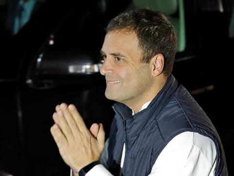 Rahul Gandhi, President of India's main opposition Congress party, greets his supporters as he arrives to attend a news conference at his party's headquarters in New Delhi, India, December 11, 2018. 
