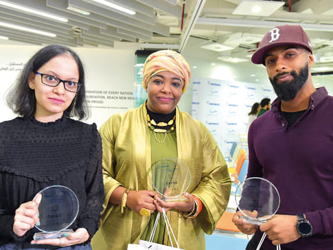 Winners from left to Right: Nidhi Jhaveri (Poetry category), Bwader El Hassan (Art category) and Khalifa Al Remethi (Music Category) at the Art of Zayed competition to encourage talented UAE residents to commemorate the Year of Zayed through music, poetry, and artwork